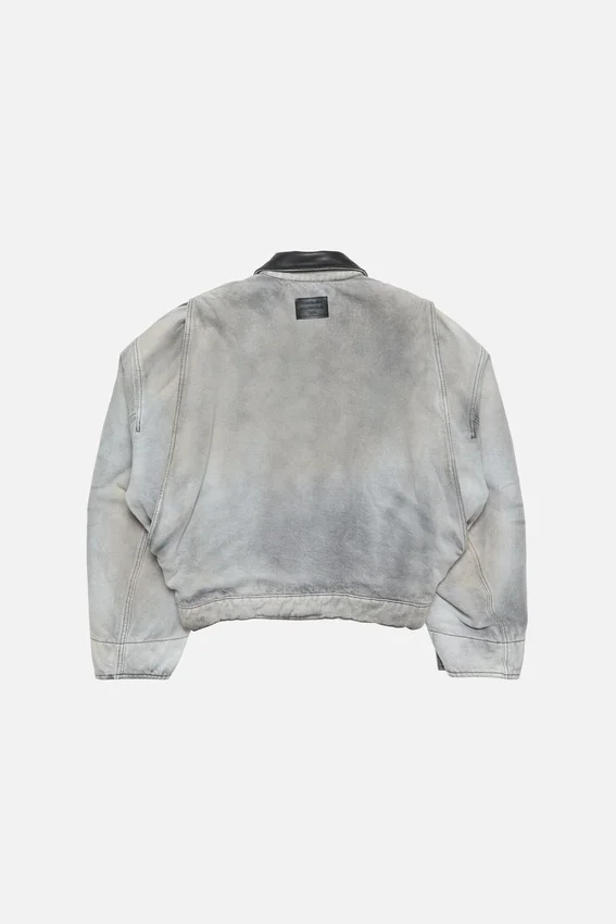 Bomberjacka i blekt denim