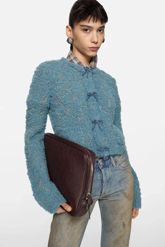 Cardigan i ull med rosett