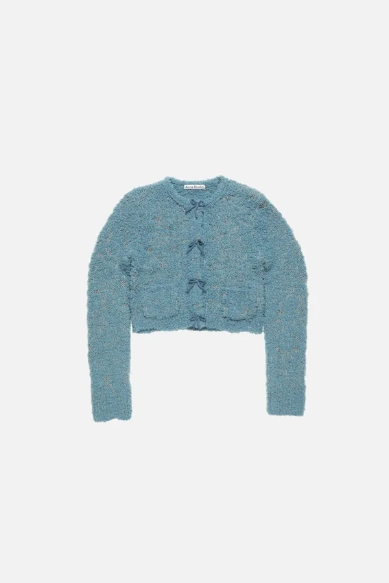 Cardigan i ull med rosett