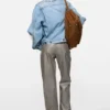 Denimjacka i slitna look