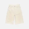 Denimshorts med färgfläckar