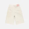 Denimshorts med färgfläckar