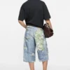 Denimshorts med trompe-l’œil-effekt