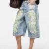 Denimshorts med trompe-l’œil-effekt