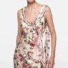 Draperad klänning med blommönster