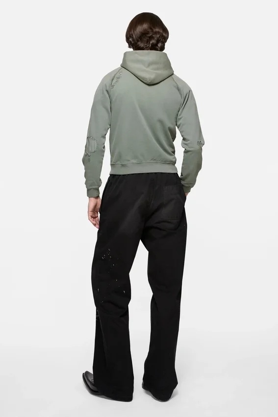 Huvtröja i fleece med lappade detaljer