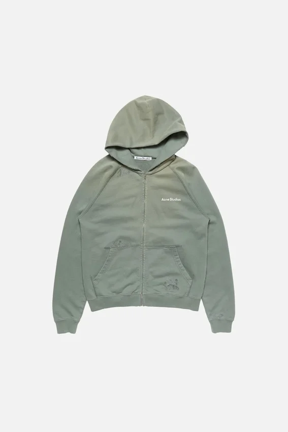 Huvtröja i fleece med lappade detaljer