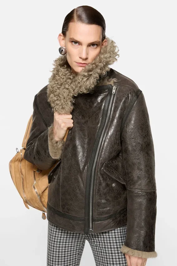 Läderjacka i shearling