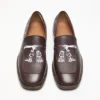 Loafers i tryckt läder
