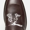 Loafers i tryckt läder