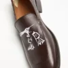 Loafers i tryckt läder