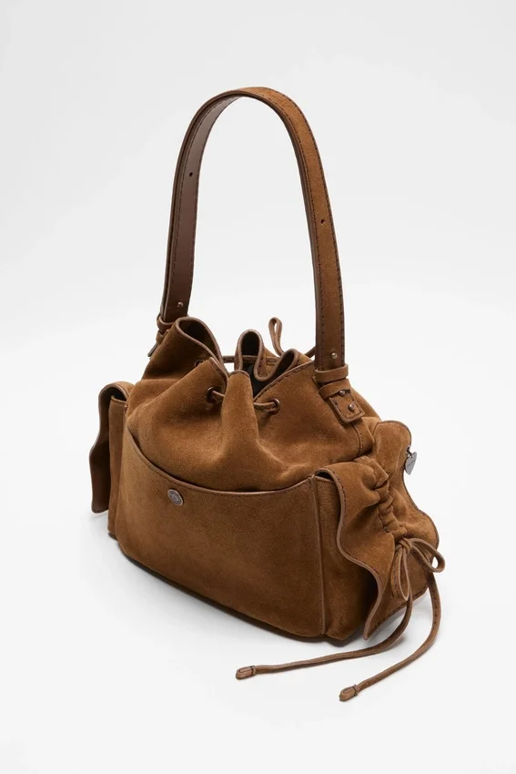 Multipocket-bucketväska i mocka
