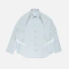 Skjorta med broderad logotyp och knappar
