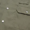 Skjorta med knappar och logotyp