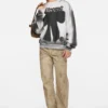Sweatshirt med sprayat logotryck