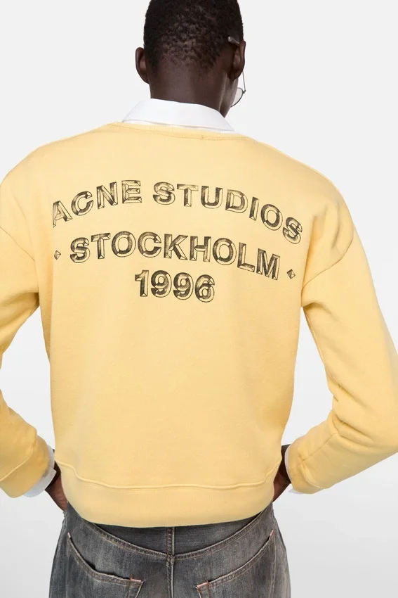Sweatshirt med sprayat logotryck