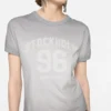 T-shirt med sprayad vintage-logotyp