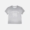 T-shirt med sprayad vintage-logotyp