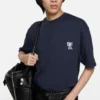 T-shirtar med logotyp i form av en rosett